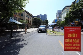 Một chốt kiểm dịch trên địa bàn phường Phúc La, quận Hà Đông, Hà Nội. (Ảnh: Tuấn Anh/TTXVN)