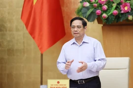 Thủ tướng Phạm Minh Chính chủ trì Phiên họp Chính phủ trực tuyến về tình hình phát triển kinh tế-xã hội tháng Bảy và 7 tháng đầu năm; nhiệm vụ, giải pháp trọng tâm tháo gỡ khó khăn những tháng cuối năm 2021. (Ảnh: Dương Giang/TTXVN)