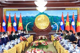 Chủ tịch nước Cộng hòa Xã hội chủ nghĩa Việt Nam Nguyễn Xuân Phúc hội đàm với Tổng Bí thư, Chủ tịch nước Lào Thongloun Sisoulith. (Ảnh: Thống Nhất/TTXVN)