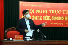 Ủy viên Trung ương Đảng, Bộ trưởng Bộ Y tế Nguyễn Thanh Long phát biểu tại hội nghị. (Ảnh: Mạnh Tú/TTXVN)