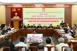 Các đại biểu biểu quyết tại Hội nghị. (Ảnh: Văn Điệp/TTXVN)