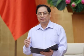Thủ tướng Phạm Minh Chính yêu cầu các bộ, ngành liên quan bám sát tình hình, kịp thời chỉ đạo hoạt động cung ứng, lưu thông hàng hóa, không để xáo trộn đời sống nhân dân. (Ảnh: Dương Giang/TTXVN)