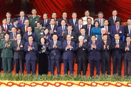 Ban Chấp hành Trung ương Đảng khóa XIII ra mắt Đại hội. (Ảnh: TTXVN)