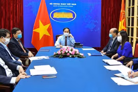 Quang cảnh buổi điện đàm. (Ảnh: TTXVN phát)