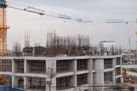 Một công trình đang được xây dựng. (Ảnh: Hoàng Nguyên/TTXVN)