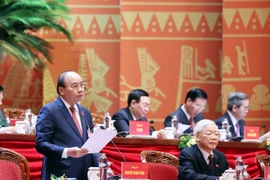 Ủy viên Bộ Chính trị, Thủ tướng Chính phủ Nguyễn Xuân Phúc thay mặt Đoàn Chủ tịch điều hành Đại hội. (Ảnh: TTXVN)