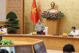 Thủ tướng Phạm Minh Chính chủ trì họp Ban Chỉ đạo Quốc gia phòng, chống dịch COVID-19. (Ảnh: Dương Giang/TTXVN)