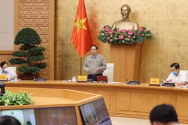 Thủ tướng Phạm Minh Chính chủ trì họp Ban Chỉ đạo Quốc gia phòng, chống dịch COVID-19. (Ảnh: Dương Giang/TTXVN)