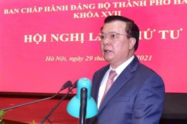 Bí thư Thành ủy Hà Nội Đinh Tiến Dũng phát biểu khai mạc hội nghị. (Ảnh: TTXVN)