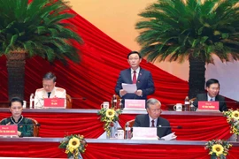 Ông Vương Đình Huệ, Ủy viên Bộ Chính trị, Bí thư Thành ủy Hà Nội thay mặt Đoàn Chủ tịch điều hành phiên họp sáng 28/1. (Ảnh: TTXVN)