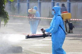 Hậu Giang diễn tập phòng, chống COVID-19 tại cụm công nghiệp. (Ảnh: Duy Khương/TTXVN)