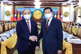 Chủ tịch nước Nguyễn Xuân Phúc và Tổng Bí thư, Chủ tịch nước Lào Thongloun Sisoulith tại buổi hội đàm. (Ảnh: Thống Nhất/TTXVN)