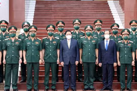 Thủ tướng Phạm Minh Chính với các đại biểu. (Ảnh: Dương Giang/TTXVN)