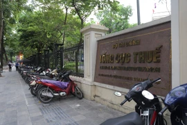 Cán bộ, nhân viên Tổng Cục được yêu cầu tạm thời ở lại trụ sở. (Ảnh: Hoàng Hiếu/TTXVN)