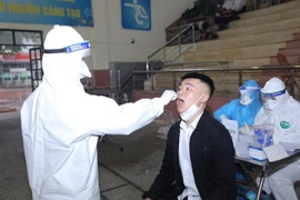 Mẫu phẩm xét nghiệm. (Ảnh: Hoàng Hiếu/TTXVN)