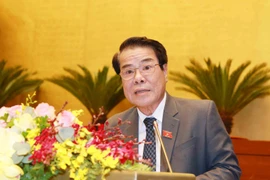 Trưởng Ban Dân nguyện của Quốc hội Dương Thanh Bình trình bày Báo cáo kết quả giám sát việc giải quyết kiến nghị của cử tri gửi đến kỳ họp thứ 10, Quốc hội khóa XIV. (Ảnh: Phương Hoa/TTXVN)