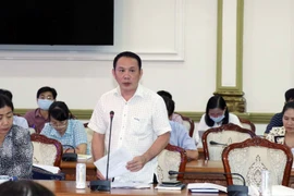 Thành viên Ủy ban bầu cử Thành phố Hồ Chí Minh phát biểu tại phiên họp. (Ảnh: Xuân Khu/TTXVN)