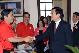 Chủ tịch nước Trương Tấn Sang đến thăm, làm việc với Trung ương Hội Chữ thập Đỏ Việt Nam. (Ảnh: Nguyễn Khang/TTXVN)