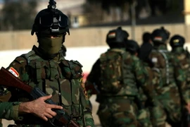 Binh sỹ quân đội Iraq trong chiến dịch giải phóng Makhmur, cách thủ đô Baghdad khoảng 280 km về phía bắc ngày 11/2. (Nguồn: AFP/TTXVN)