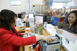 Giao dịch tại VietinBank. (Nguồn: TTXVN)