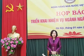 Phó Thống đốc NHNN Nguyễn Thị Hồng phát biểu tại buổi họp báo. (Ảnh: T.H/Vietnam+)