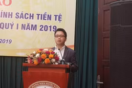 Ông Nghiêm Thanh Sơn, Phó vụ trưởng Vụ Thanh toán phát biểu tại họp báo. (Ảnh: TH/Vietnam+)