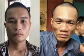 Đối tượng Phạm Hùng Sang (trái) và Nguyễn Ngọc Thắng. (Ảnh: Nguyễn Khánh/TTXVN)