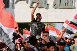 Người dân phản đối tham nhũng và dịch vụ công yếu kém tại Baghdad, Iraq ngày 20/7. (Ảnh: THX/TTXVN)