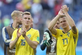 Các tuyển thủ Thụy Điển mừng chiến thắng sau trận đấu tại vòng 1/8 với Thụy Sĩ. (Nguồn: THX/TTXVN)