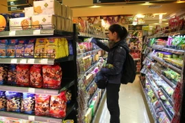 Hàng hóa được bày bán tại một siêu thị ở Bắc Kinh, Trung Quốc. (Nguồn: AFP/ TTXVN)