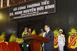 Ủy viên Bộ Chính trị, Trưởng Ban Tổ chức Trung ương Phạm Minh Chính đọc điếu văn tại Lễ truy điệu. (Ảnh: Doãn Tấn/TTXVN)