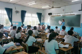 Hoạt động dạy học tại Trường Trung học cơ sở Sương Nguyệt Anh (Quận 8) trong tháng 3. (Ảnh: Thu Hoài/TTXVN)