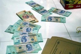 Tang vật vụ đánh bạc ngàn tỷ tại Sóc Trăng. (Ảnh: TTXVN phát)