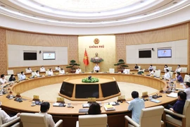 Thủ tướng Phạm Minh Chính chủ trì họp Chính phủ chuyên đề về xây dựng pháp luật. (Ảnh: Dương Giang/TTXVN)