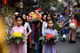 Đoàn rước lễ sẽ mặc trang phục truyền thống để tôn vinh những giá trị cổ truyền. (Ảnh: PV/Vietnam+)