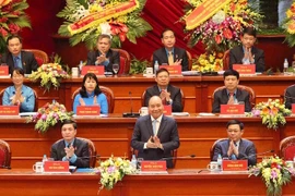 Thủ tướng Nguyễn Xuân Phúc đối thoại với đại biểu tham gia Đại hội Công đoàn Việt Nam lần thứ XII. (Ảnh: TTXVN)