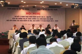  Hội nghị sơ kết 5 năm thực hiện Nghị quyết số 21-NQ/TW về tăng cường sự lãnh đạo của Đảng đối với công tác bảo hiểm xã hội, bảo hiểm y tế. (Ảnh: PV/Vietnam+)