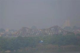 Nhiều khu vực tại Hà Nội chìm trong sương mù. (Ảnh: Tuấn Đức/TTXVN)