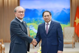 Thủ tướng Phạm Minh Chính tiếp ông Akiba Takeo, Tổng Thư ký Hội đồng An ninh Quốc gia Nhật Bản. (Ảnh: Dương Giang/TTXVN)