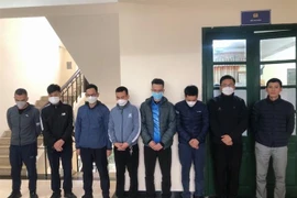 Các đối tượng bị tam giữ. (Ảnh: TTXVN phát)