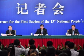 Phó Chủ nhiệm Ủy ban Cải cách và phát triển quốc gia của Trung Quốc Ninh Cát Triết (trái). (Nguồn: THX/TTXVN)