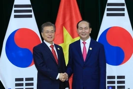 Chủ tịch nước Trần Đại Quang gặp song phương Tổng thống Hàn Quốc Moon Jae-in nhân dịp tham dự Tuần lễ Cấp cao APEC 2017. (Ảnh: TTXVN)