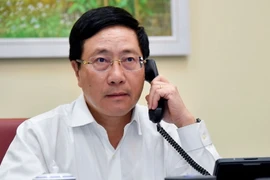 Phó Thủ tướng Phạm Bình Minh điện đàm với cựu Thủ tướng Anh Tony Blair