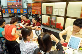 Vàng SJC chững lại sau khi tuột khỏi mốc 36 triệu đồng mỗi lượng 
