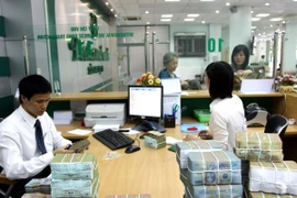 Chính phủ ưu tiên giải quyết vấn đề nợ xấu của các ngân hàng 