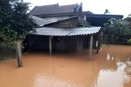 Mưa lớn gây ngập lụt trở lại tại thị trấn Cam Lộ, huyện Cam Lộ, tỉnh Quảng Trị. (Ảnh: Hồ Cầu/TTXVN)