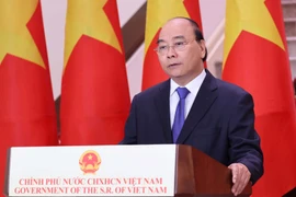 Thủ tướng Nguyễn Xuân Phúc biểu chúc mừng Hội chợ Trung Quốc-ASEAN (CAEXPO) lần thứ 17. (Ảnh: Thống Nhất/TTXVN)