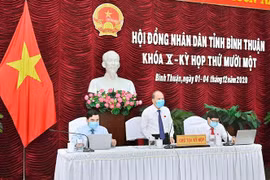 Chủ tọa Kỳ họp thứ 11 Hội đồng Nhân dân tỉnh Bình Thuận khóa X. (Ảnh: Nguyễn Thanh/TTXVN)