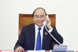 Thủ tướng Chính phủ Nguyễn Xuân Phúc điện đàm với Thủ tướng Thái Lan. (Ảnh: Thống Nhất/TTXVN)