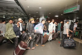 Hai lao động "kêu cứu" ở Malaysia đã về Việt Nam an toàn